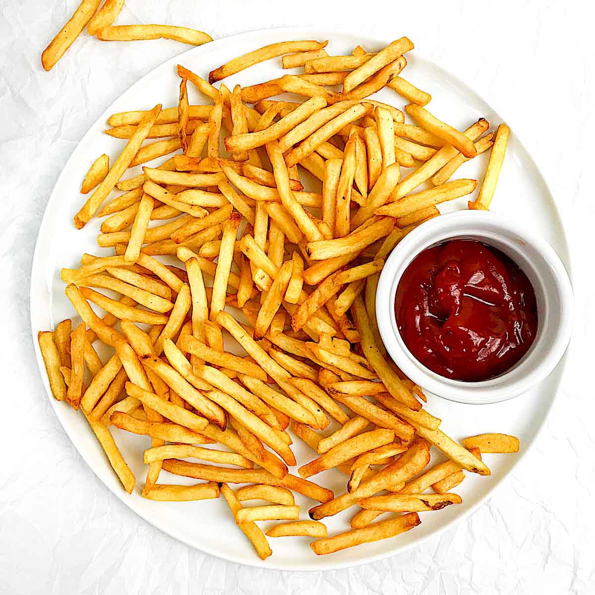 Air Fryer Frozen French Fries {Timings for all types!} - Plated