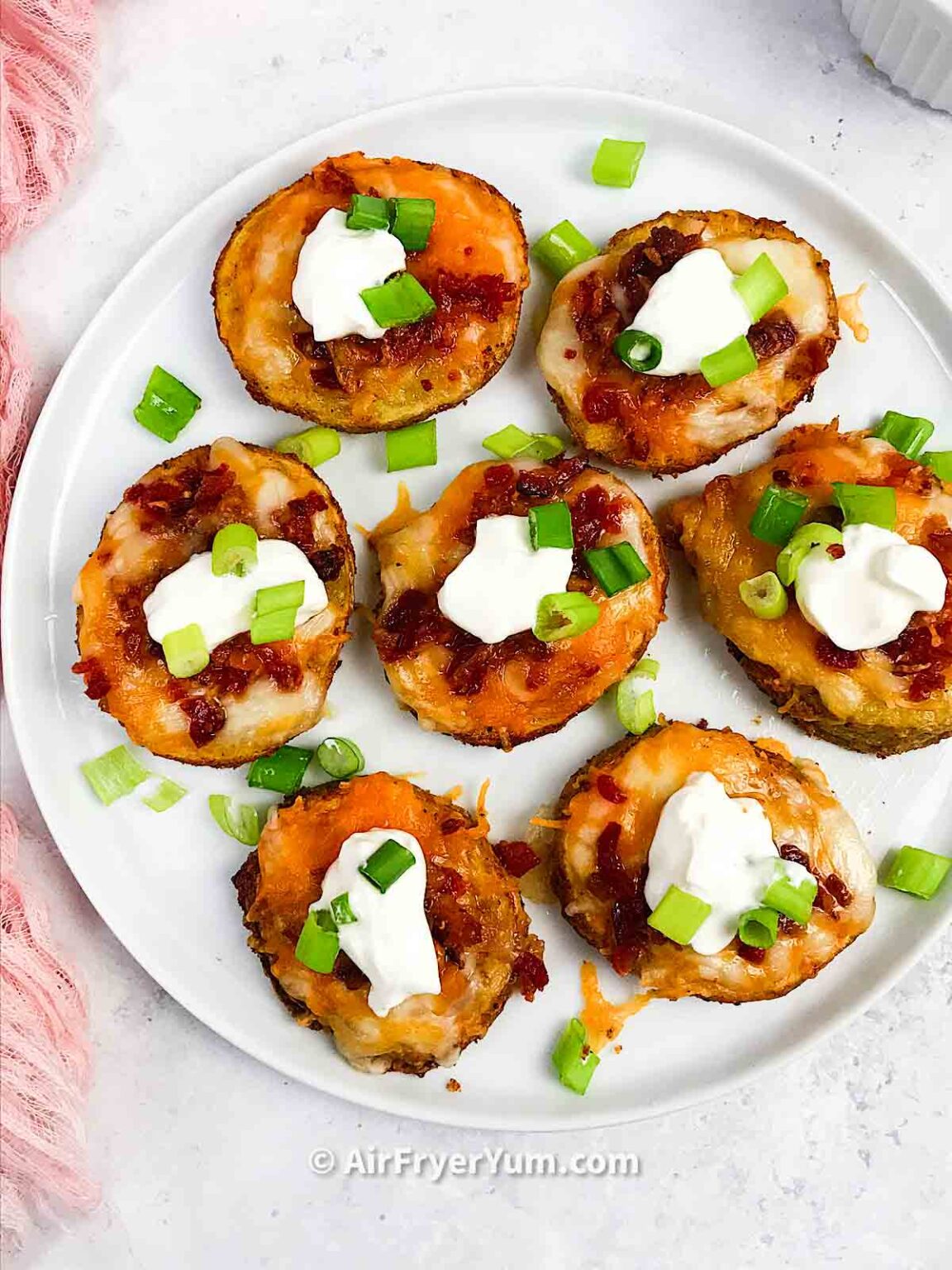 Air fryer baked potato loaded with sour cream cheddar halal chicken bacon and chive for easy weeknight dinner